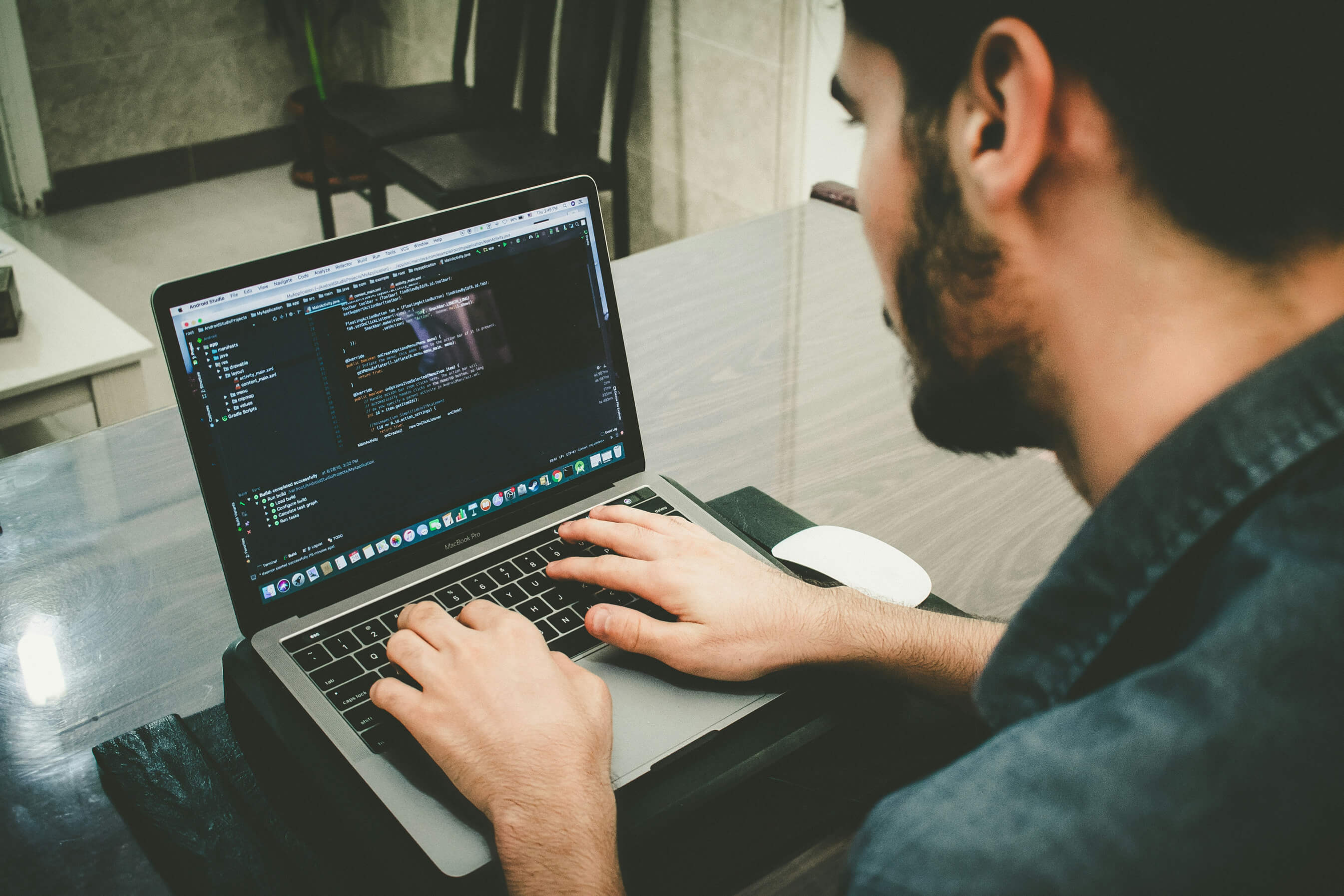 A sleek workstation displaying clean code on a dark theme